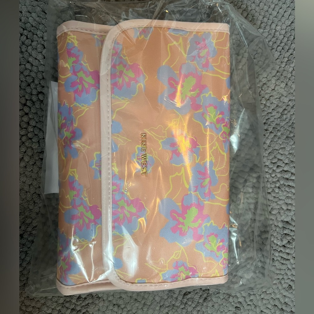 Floral Nine West travel hanging makeup bag.